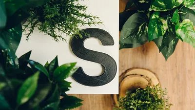 MadeByShape letter S on a desk